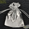 Подарочный мешочек из серебристой парчи - для серёжек, колец